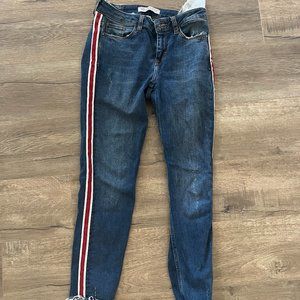 Skinny denim jeans with red and white stripe down leg. Size 2.